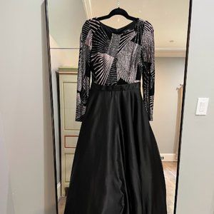 USED Gorgeous Black Gown with Rose Gold Glitter Boddice and Long Sleeves
